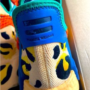 Pharrell Williams NMD Human Race animal print size 12. Orange and blue/green.